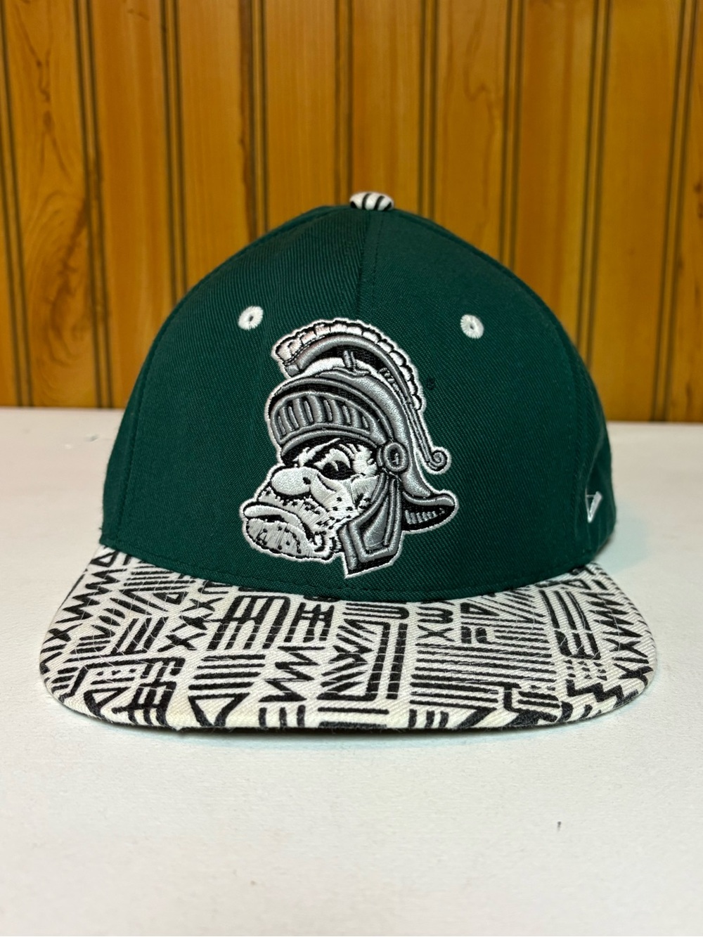 Zephyr Green Hat with Red and Navy Logo Patch